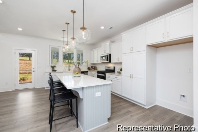 Introducing The Lenox, an all-time favorite floorplan that has on Edgewater Golf Club in South Carolina - for sale on GolfHomes.com, golf home, golf lot