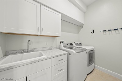 Beautifully remodeled villa with long views across the ninth on The Sanctuary Golf Club in Florida - for sale on GolfHomes.com, golf home, golf lot