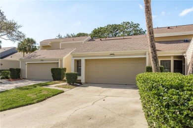 The grass is always green when you live on a golf course - on Countryside Country Club in Florida - for sale on GolfHomes.com, golf home, golf lot