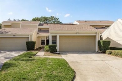 The grass is always green when you live on a golf course - on Countryside Country Club in Florida - for sale on GolfHomes.com, golf home, golf lot