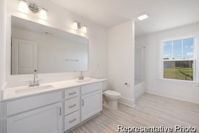 Introducing The Lenox, an all-time favorite floorplan that has on Edgewater Golf Club in South Carolina - for sale on GolfHomes.com, golf home, golf lot