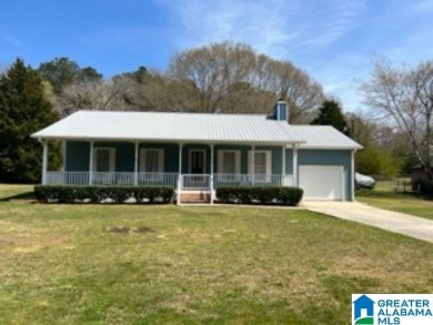 Nice one level home on large lot. Seller just painted the house on Pell City Country Club in Alabama - for sale on GolfHomes.com, golf home, golf lot
