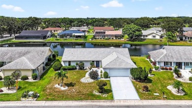 Serene Pond View  Sunlit Elegance in Sun City Center's Premier on North Lakes Golf Course in Florida - for sale on GolfHomes.com, golf home, golf lot