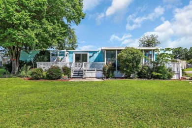 Discover coastal living with this charming property, ideally on Barefoot Resort and Golf Club  in South Carolina - for sale on GolfHomes.com, golf home, golf lot