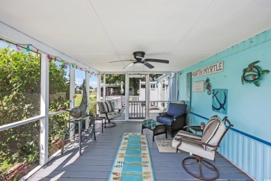 Discover coastal living with this charming property, ideally on Barefoot Resort and Golf Club  in South Carolina - for sale on GolfHomes.com, golf home, golf lot