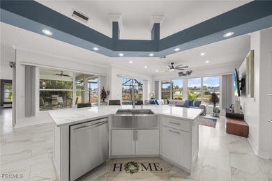 Highly desirable Gulf access home in Southwest Cape Coral, fully on Royal Tee Country Club in Florida - for sale on GolfHomes.com, golf home, golf lot