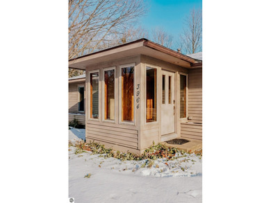 Usually, you have to choose between a golf course setting, water on Grand Traverse Resort and Spa in Michigan - for sale on GolfHomes.com, golf home, golf lot