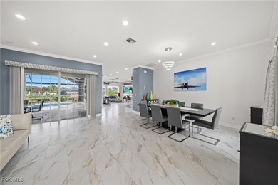 Highly desirable Gulf access home in Southwest Cape Coral, fully on Royal Tee Country Club in Florida - for sale on GolfHomes.com, golf home, golf lot