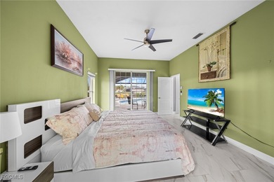 Highly desirable Gulf access home in Southwest Cape Coral, fully on Royal Tee Country Club in Florida - for sale on GolfHomes.com, golf home, golf lot