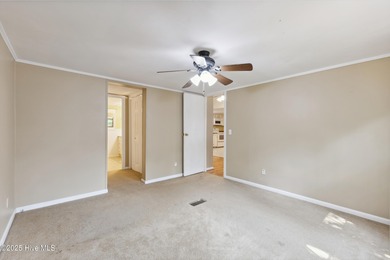 *PRICE REDUCED* This well-maintained home, with a fenced-in on Oyster Bay Golf Links in North Carolina - for sale on GolfHomes.com, golf home, golf lot