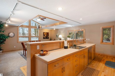 Usually, you have to choose between a golf course setting, water on Grand Traverse Resort and Spa in Michigan - for sale on GolfHomes.com, golf home, golf lot