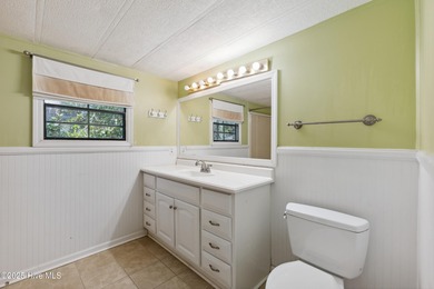 *PRICE REDUCED* This well-maintained home, with a fenced-in on Oyster Bay Golf Links in North Carolina - for sale on GolfHomes.com, golf home, golf lot