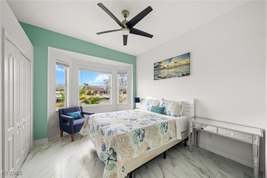 Highly desirable Gulf access home in Southwest Cape Coral, fully on Royal Tee Country Club in Florida - for sale on GolfHomes.com, golf home, golf lot