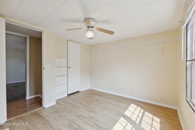 *PRICE REDUCED* This well-maintained home, with a fenced-in on Oyster Bay Golf Links in North Carolina - for sale on GolfHomes.com, golf home, golf lot