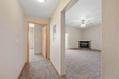 This is a wonderful 2 bed 2 bath golf course condo across from on Blue Top Ridge At Riverside in Iowa - for sale on GolfHomes.com, golf home, golf lot