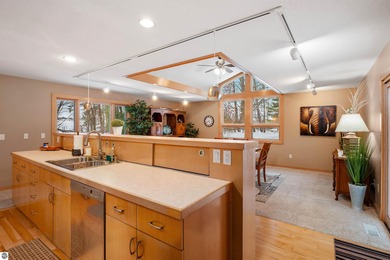 Usually, you have to choose between a golf course setting, water on Grand Traverse Resort and Spa in Michigan - for sale on GolfHomes.com, golf home, golf lot