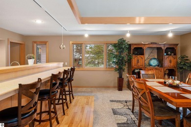 Usually, you have to choose between a golf course setting, water on Grand Traverse Resort and Spa in Michigan - for sale on GolfHomes.com, golf home, golf lot