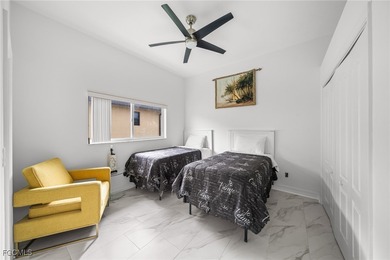 Highly desirable Gulf access home in Southwest Cape Coral, fully on Royal Tee Country Club in Florida - for sale on GolfHomes.com, golf home, golf lot