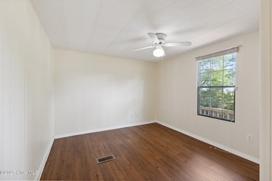 *PRICE REDUCED* This well-maintained home, with a fenced-in on Oyster Bay Golf Links in North Carolina - for sale on GolfHomes.com, golf home, golf lot