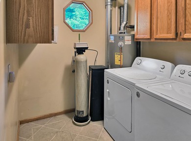 Welcome to this beautiful ranch-style home perfectly positioned on White Deer Country Club in Michigan - for sale on GolfHomes.com, golf home, golf lot