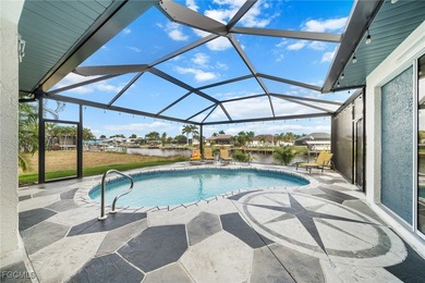 Highly desirable Gulf access home in Southwest Cape Coral, fully on Royal Tee Country Club in Florida - for sale on GolfHomes.com, golf home, golf lot