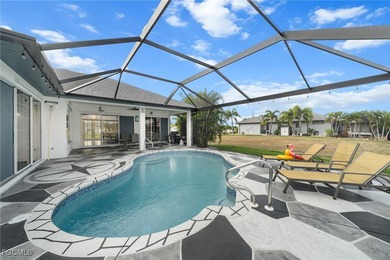 Highly desirable Gulf access home in Southwest Cape Coral, fully on Royal Tee Country Club in Florida - for sale on GolfHomes.com, golf home, golf lot