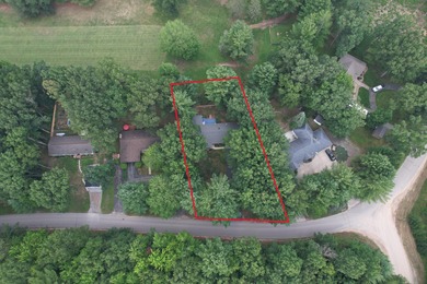 Welcome to this beautiful ranch-style home perfectly positioned on White Deer Country Club in Michigan - for sale on GolfHomes.com, golf home, golf lot