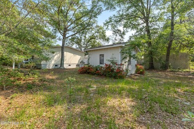 *PRICE REDUCED* This well-maintained home, with a fenced-in on Oyster Bay Golf Links in North Carolina - for sale on GolfHomes.com, golf home, golf lot