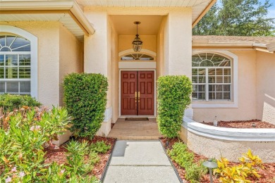 Welcome to your dream home in the gated community of East Lake on East Lake Woodlands Country Club in Florida - for sale on GolfHomes.com, golf home, golf lot