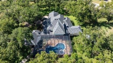 Bring your plane, boat, RV, horses, and golf clubs, this gated on Pecan Plantation Country Club in Texas - for sale on GolfHomes.com, golf home, golf lot