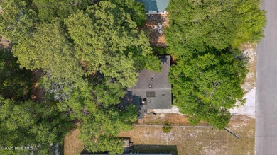 *PRICE REDUCED* This well-maintained home, with a fenced-in on Oyster Bay Golf Links in North Carolina - for sale on GolfHomes.com, golf home, golf lot