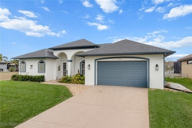 Highly desirable Gulf access home in Southwest Cape Coral, fully on Royal Tee Country Club in Florida - for sale on GolfHomes.com, golf home, golf lot