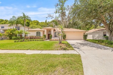 Welcome to your dream home in the gated community of East Lake on East Lake Woodlands Country Club in Florida - for sale on GolfHomes.com, golf home, golf lot