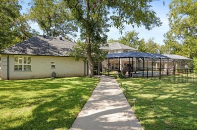 Bring your plane, boat, RV, horses, and golf clubs, this gated on Pecan Plantation Country Club in Texas - for sale on GolfHomes.com, golf home, golf lot