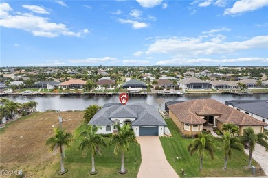 Highly desirable Gulf access home in Southwest Cape Coral, fully on Royal Tee Country Club in Florida - for sale on GolfHomes.com, golf home, golf lot