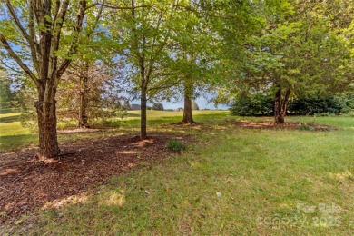This stunning brick home, located in the Crescent Vistas, sits on  in North Carolina - for sale on GolfHomes.com, golf home, golf lot
