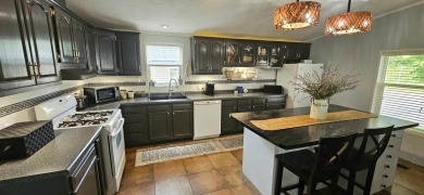 PRIDE OF OWNERSHIP! This beautiful home has been updated and on Rivers Edge Golf Club in Nebraska - for sale on GolfHomes.com, golf home, golf lot