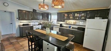 PRIDE OF OWNERSHIP! This beautiful home has been updated and on Rivers Edge Golf Club in Nebraska - for sale on GolfHomes.com, golf home, golf lot