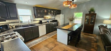 PRIDE OF OWNERSHIP! This beautiful home has been updated and on Rivers Edge Golf Club in Nebraska - for sale on GolfHomes.com, golf home, golf lot
