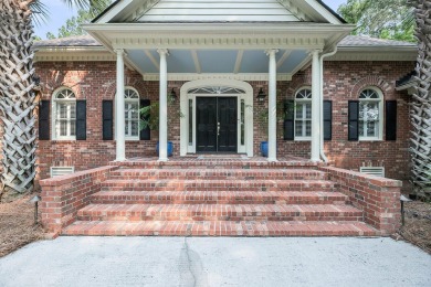 Tucked behind the gates of Dunes West, this beautifully on Dunes West Golf Club in South Carolina - for sale on GolfHomes.com, golf home, golf lot