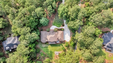 Tucked behind the gates of Dunes West, this beautifully on Dunes West Golf Club in South Carolina - for sale on GolfHomes.com, golf home, golf lot