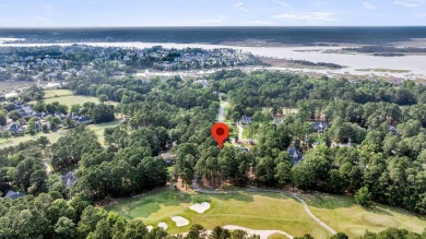 Tucked behind the gates of Dunes West, this beautifully on Dunes West Golf Club in South Carolina - for sale on GolfHomes.com, golf home, golf lot