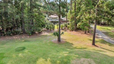 Tucked behind the gates of Dunes West, this beautifully on Dunes West Golf Club in South Carolina - for sale on GolfHomes.com, golf home, golf lot