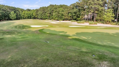 Tucked behind the gates of Dunes West, this beautifully on Dunes West Golf Club in South Carolina - for sale on GolfHomes.com, golf home, golf lot