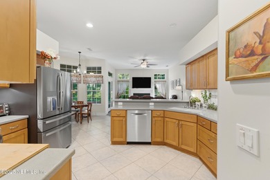 Enjoy a peaceful backyard with mature trees surrounding this on Country Club of Orange Park in Florida - for sale on GolfHomes.com, golf home, golf lot