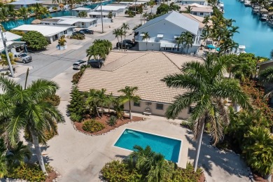 Motivated Seller - Optional Dry Boat Slip!Spacious 3 bed, 2 bath on Key Colony Beach Golf Course in Florida - for sale on GolfHomes.com, golf home, golf lot