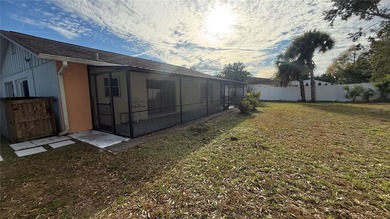 Do you like to play Golf? Are you looking for a place in a quiet on Palm Harbor Golf Club in Florida - for sale on GolfHomes.com, golf home, golf lot