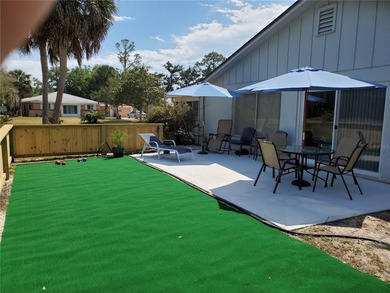 Do you like to play Golf? Are you looking for a place in a quiet on Palm Harbor Golf Club in Florida - for sale on GolfHomes.com, golf home, golf lot