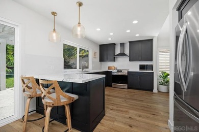 Discover modern luxury in this beautifully reimagined 4 bedroom on La Costa Resort and Spa in California - for sale on GolfHomes.com, golf home, golf lot