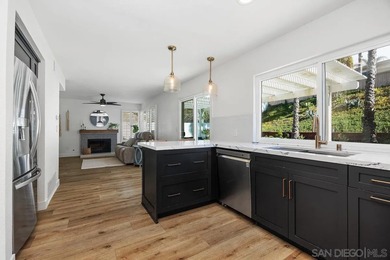 Discover modern luxury in this beautifully reimagined 4 bedroom on La Costa Resort and Spa in California - for sale on GolfHomes.com, golf home, golf lot